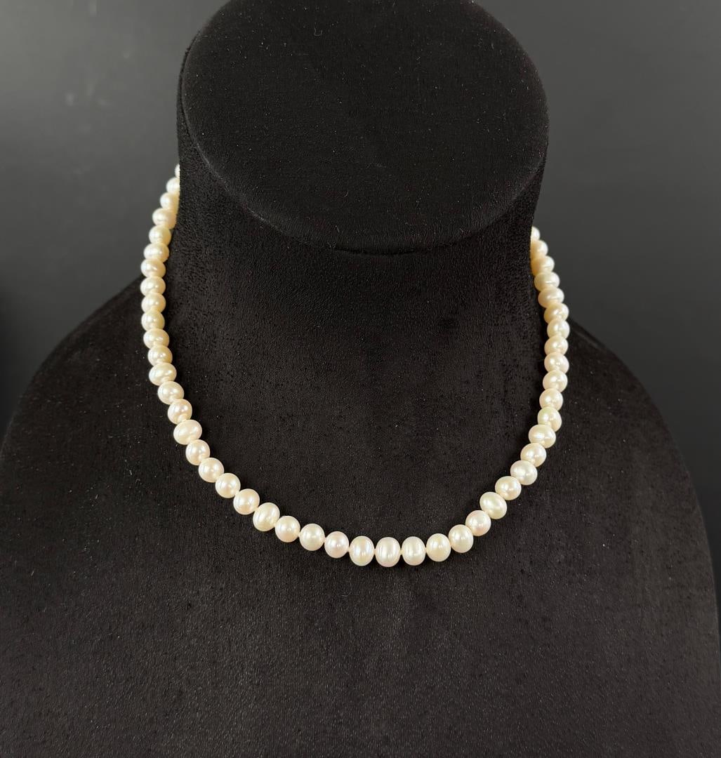 Sterling Silver Cultured Pearl Necklace: 29.02 grams.
