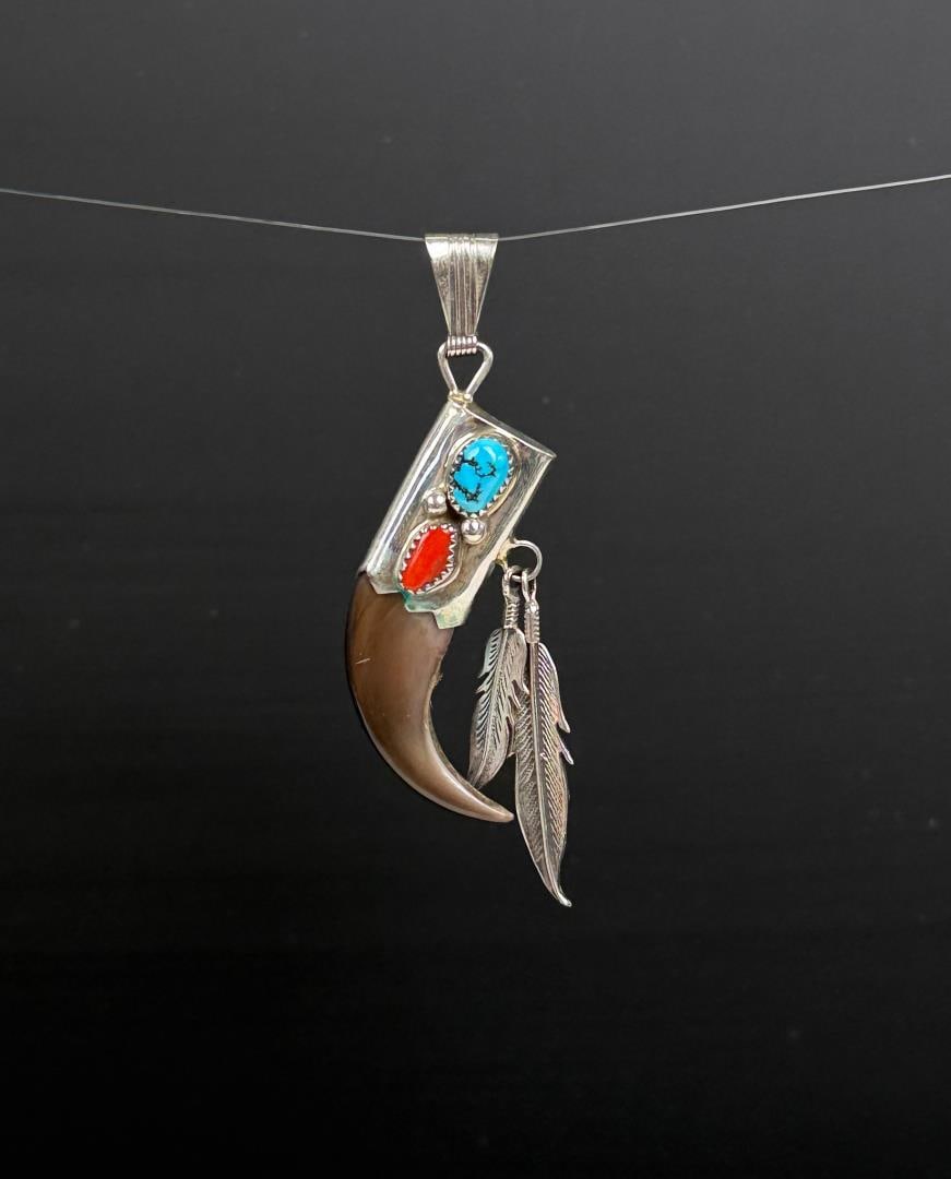 Running Bear Navajo Sterling Bear Claw Pendant: 3 1/8" long. 10.33 grams. Only for sale where legal. No International Sales. Know your own laws. No sales to Alabama, California, Florida, Georgia, Mississippi, Kentucky, Massachusetts, Nebraska,