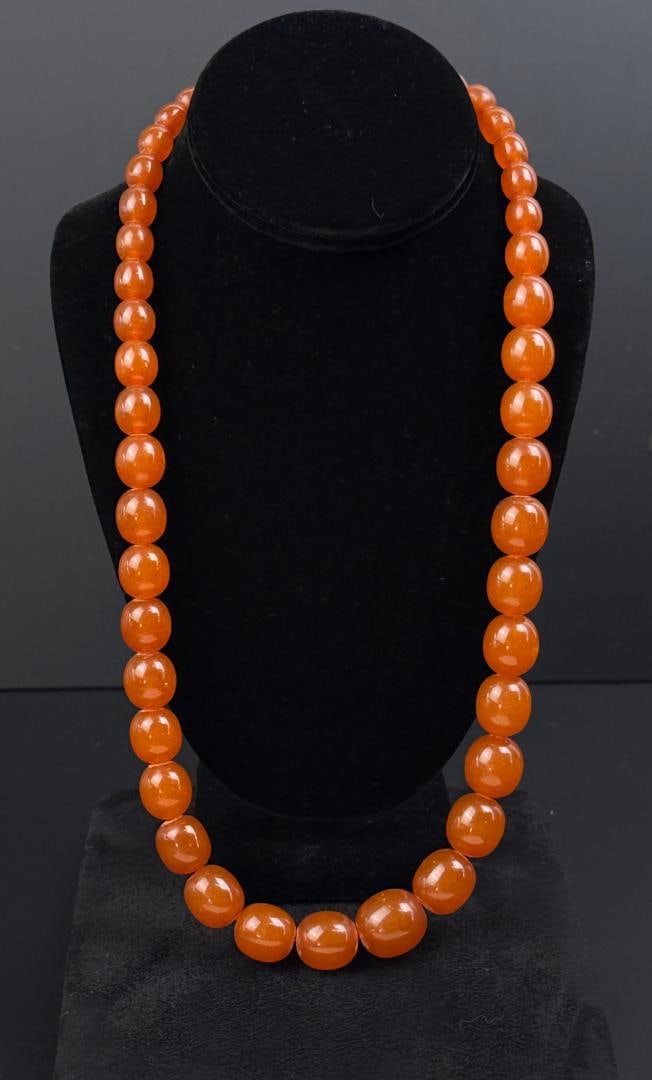 Baltic Amber Graduated Prayer Bead Necklace: 12 3/8" long as shown, 77 grams.
