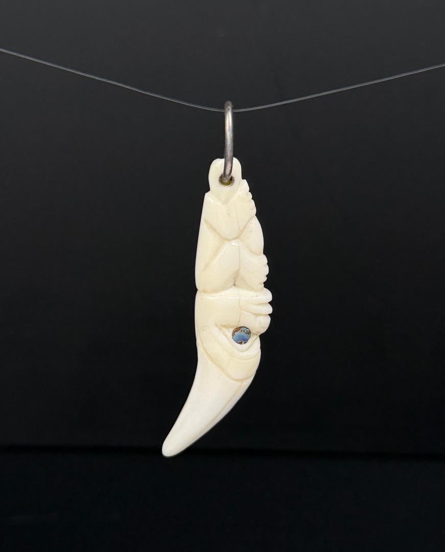 Haida Northwest Coast Indian Bear Tooth Pendant: 2 3/4" long.