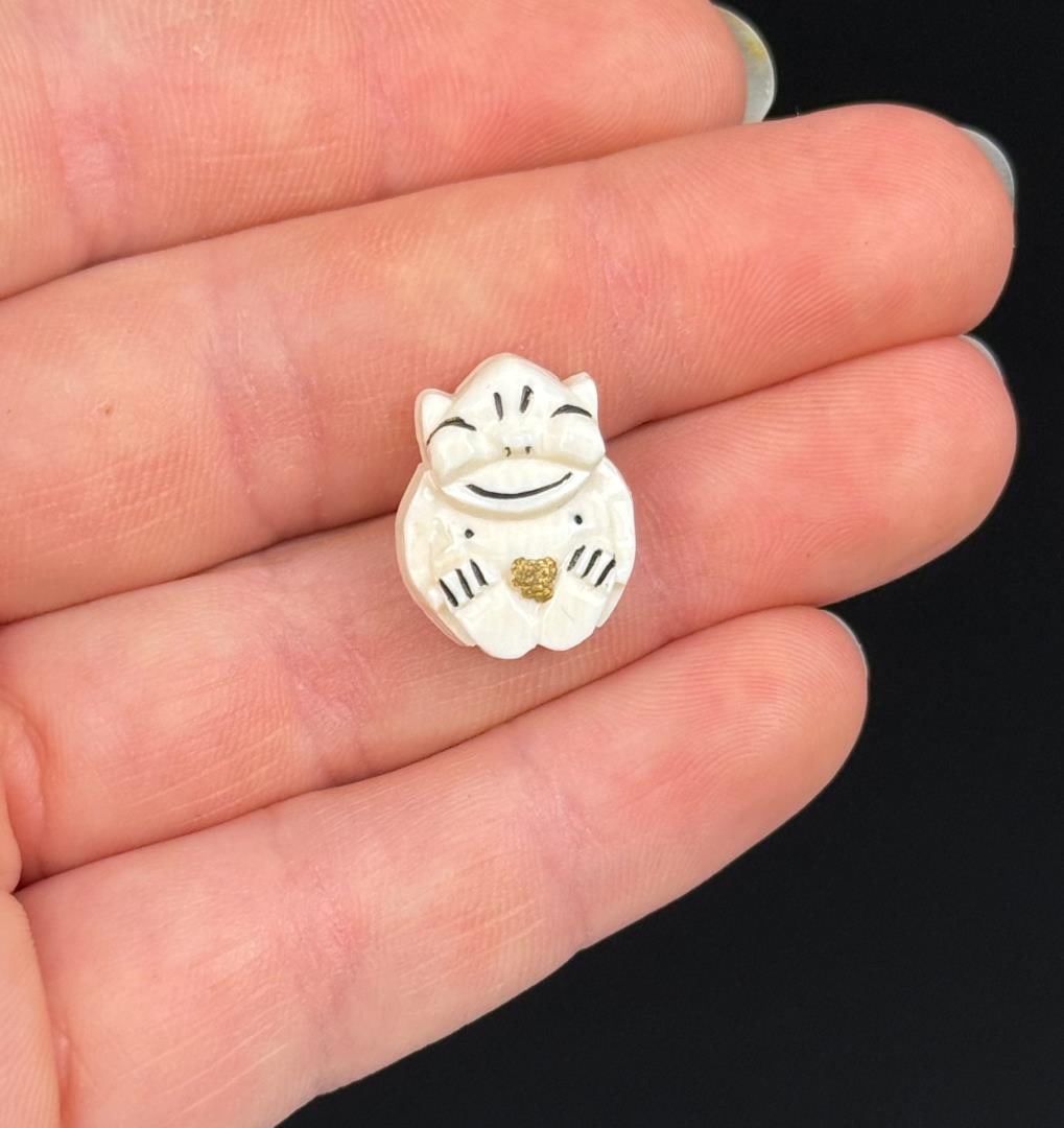 Alaskan Inuit Eskimo Gold Nugget Billiken Pin: 1/2" by 5/8". 1.52 grams. Native made prior to 1972. This item cannot be shipped to Oregon, California, Hawaii, New York, New Jersey, Internationally, or any other state that prohibits.