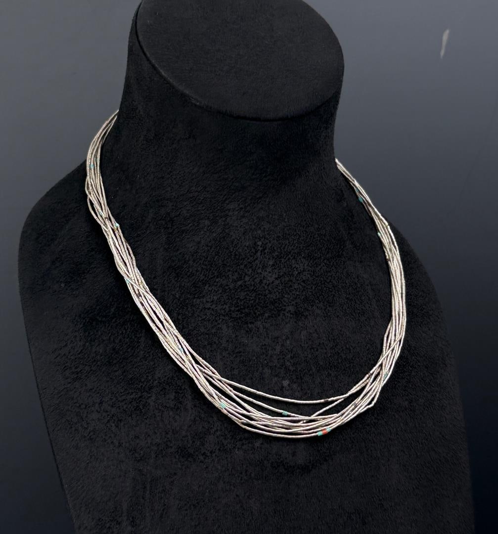 Santo Domingo Pueblo Liquid Silver Necklace: 44.41 grams. 11" long as displayed.