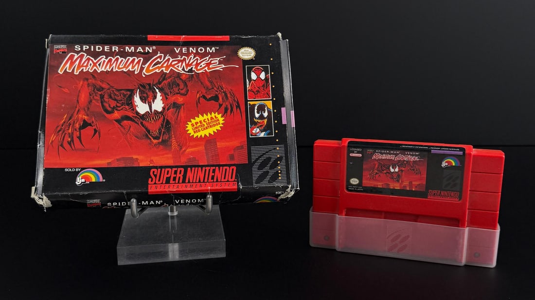Spider Man Venom Maximum Carnage SNES Video Game: Nice example in box. Red cartridge.