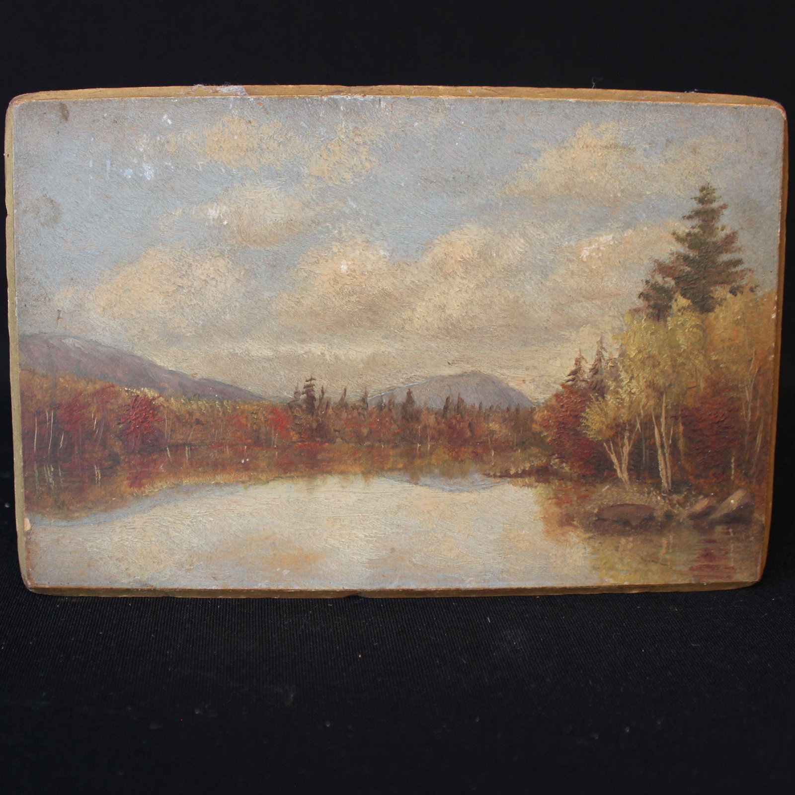 UNSIGNED 0/B PAINTING WHITE MT SCENE: Miniature 19th c oil on Board of a New Hampshire White Mountain scene on artist board unsigned. Condition is very dirty some minor scraps on artist board, consistent with age. Size 4" x 6.25"