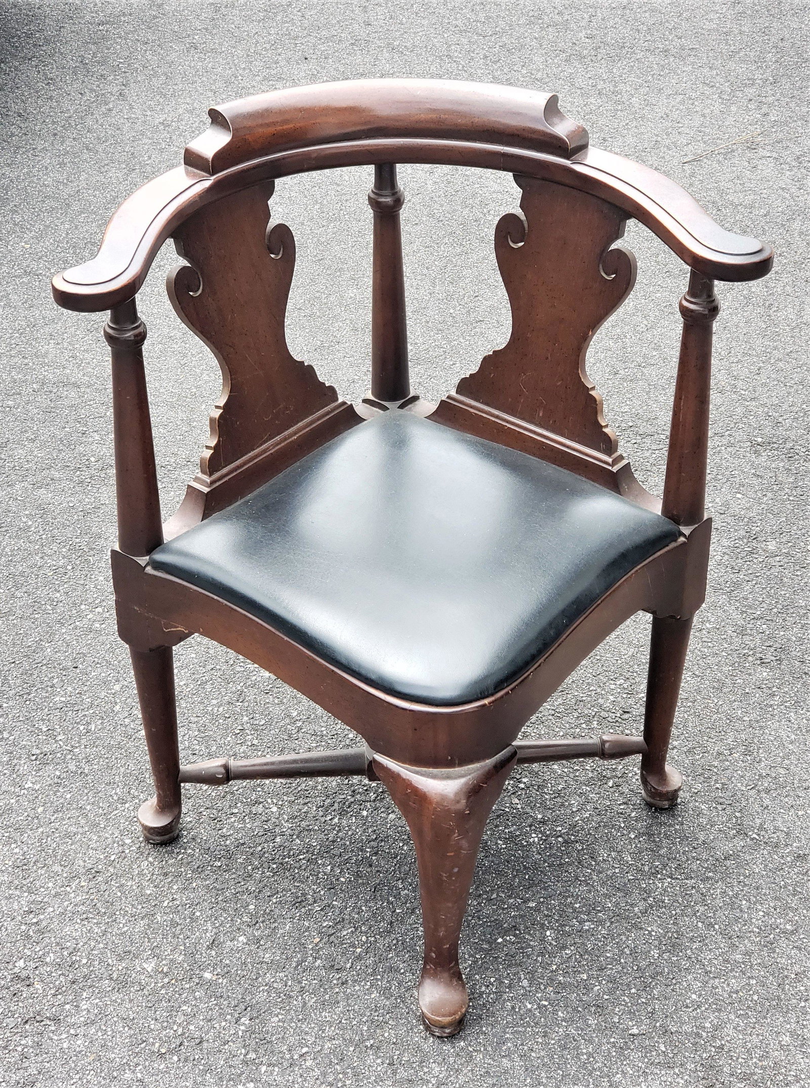 QUEEN ANNE CORNER CHAIR: Reproduction early 1900's of a Queen Anne corner chair with black leather seat. size 30" H x 19" Condition consistent with age some scratches and worn spots.