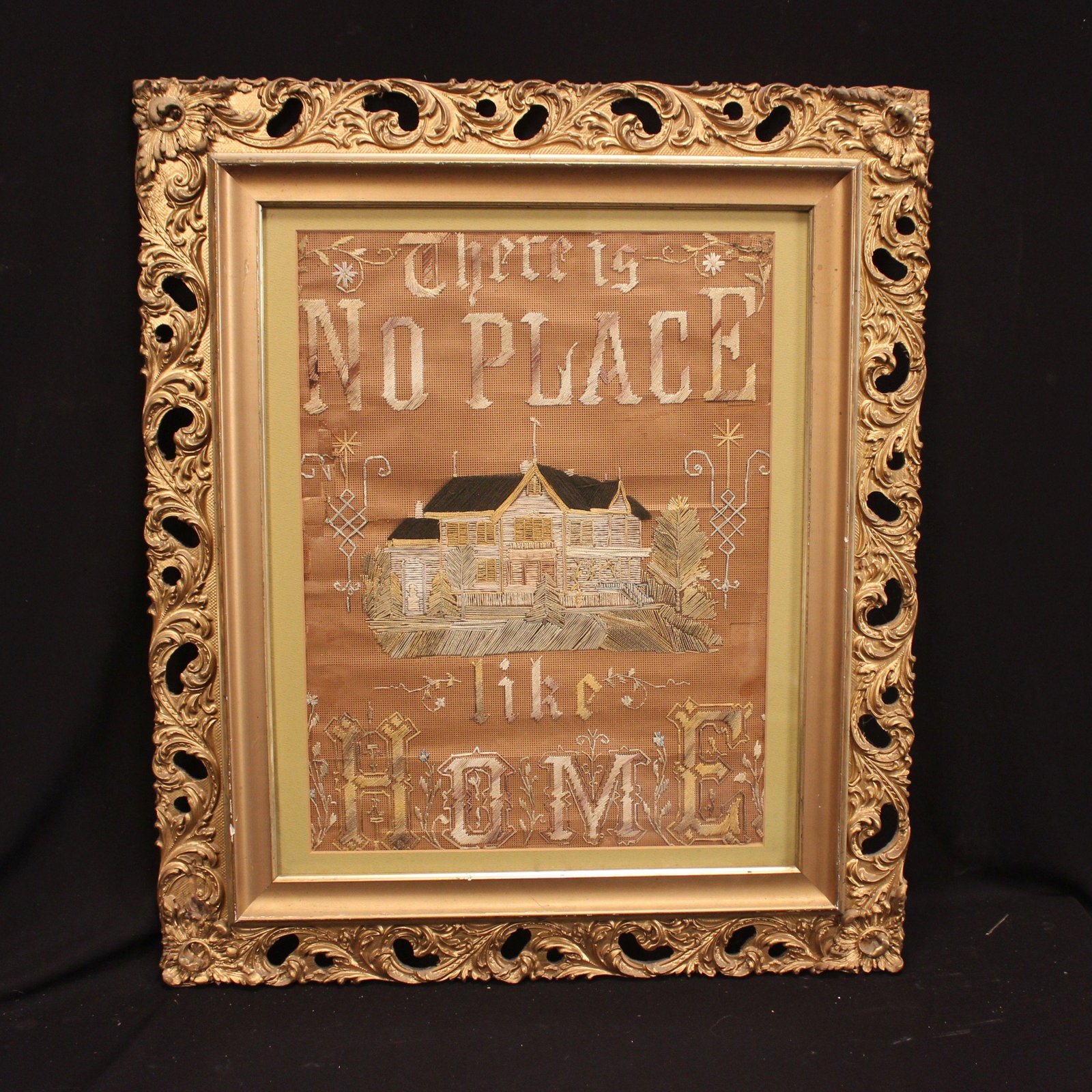 AMERICAN VICTORIAN EMBROIDED MOTTO: Needlepoint on paper in original frame. "No Place Like Home" Size 18" x 13.5 .