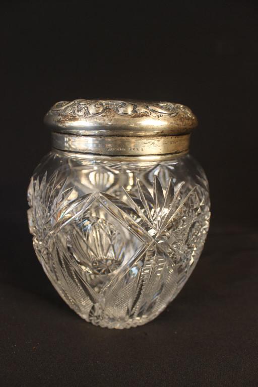 STERLING CUT GLASS HUMIDOR: Sterling silver top chased and embossed fine quality might be Howard Sterling Co. 2.2 troy ounces, monogrammed. The cut glass bottom is American brilliant period with just a few flea bits to the glass