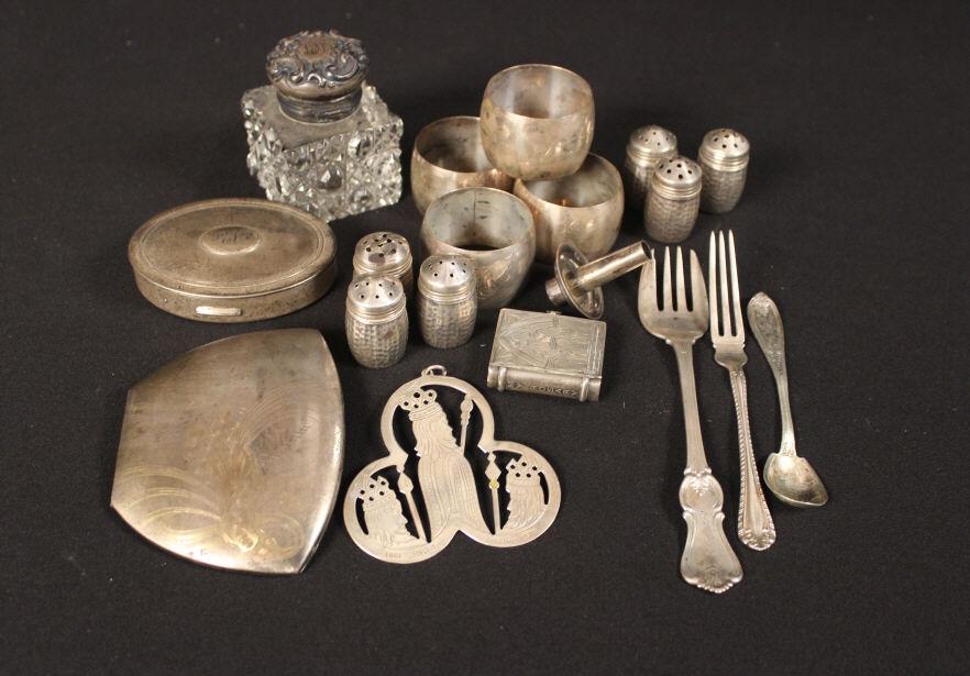 GROUPING OF STERLING: 4 sterling napkin rings, sterling compact Majestic US, Sterling Lunt Christmas 1973, Sterling top ink well, Sterling Elgin compact, Sterling rosary holder, (6) s/p shakers & 3 pieces not marked sterli
