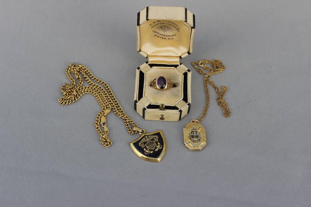 14K SIGNET RING & TWO NAVAL PENDANTS: 1915 signet ring with red center stone, original box. total ring weight 5.8 grams. USN Locket 12k gold filled & sterling, Gold filled Naval Anchors Away pendant on a silver (925) gold washed chain.