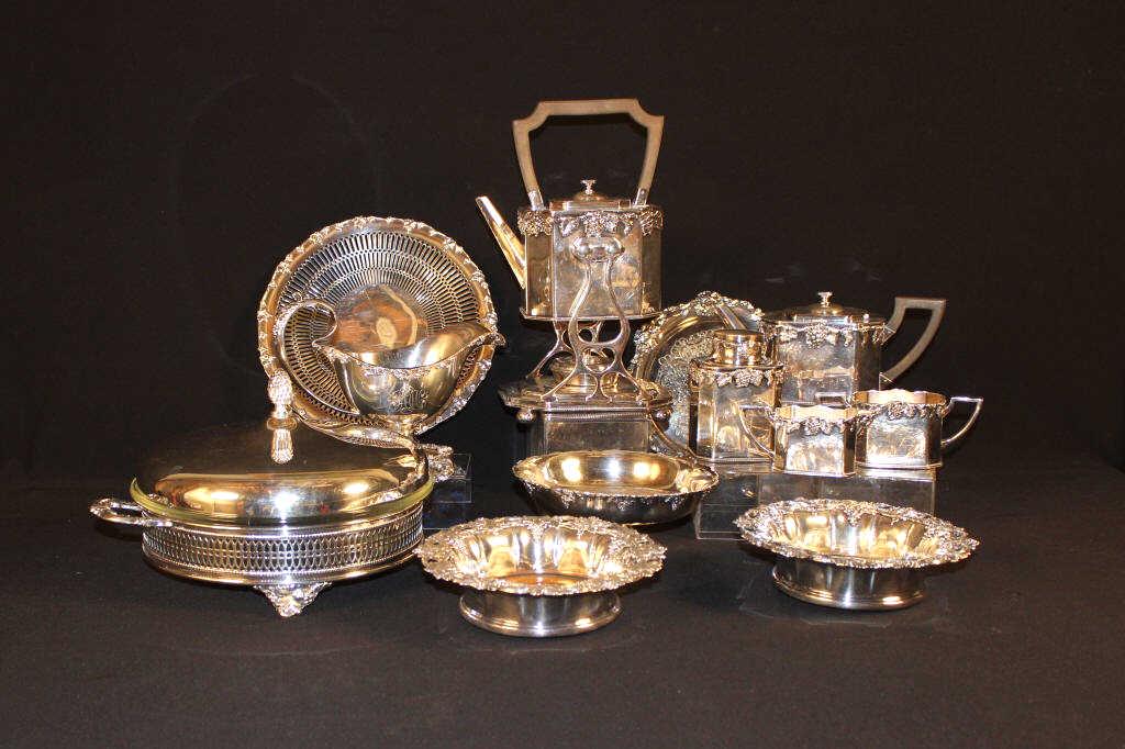 Grouping of Grape Leaf Silver Plate: (5) piece tea set, covered cake dish, gravy boat, footed bowl, (2) small dishes, (2) wine coasters, minor scratches from use