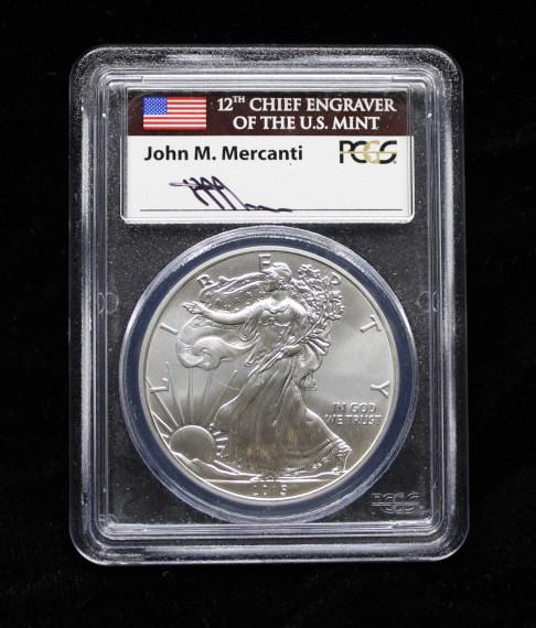 2015 $1 American Silver Eagles, signed (1 of 2)