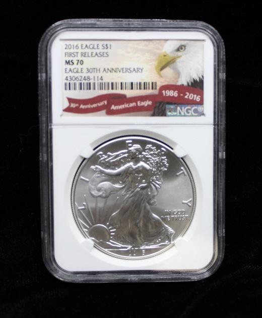 2016 $1 American Silver Eagles, signed (1 of 2)
