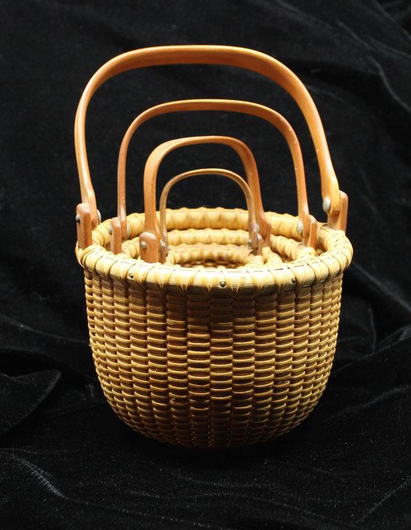 Four Nesting Nantucket Baskets A.D.R. (1 of 9)
