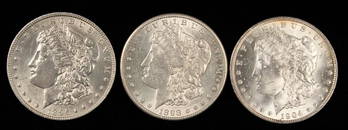 (3) Morgan Silver Dollars