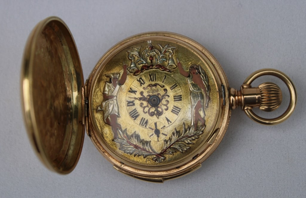 14K European Concealed Erotic Pocket Watch: Engraved and monogrammed antique erotica pocket watch in a 14K hunters case. Age 50 t0 100 years. This watch is in running order but not guaranteed.