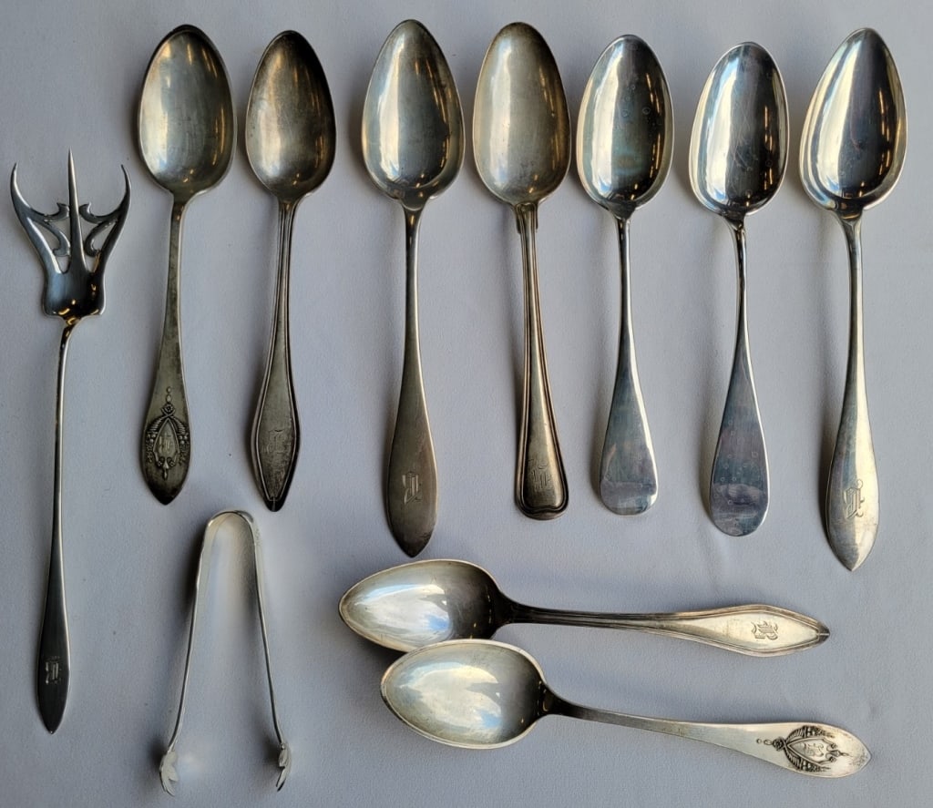 Sterling Silver Flatware: Weight 24.5 troy oz.