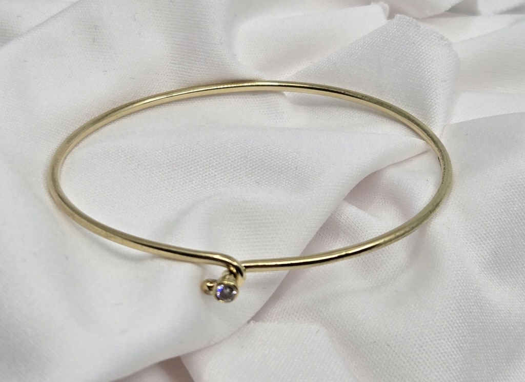 Tiffany & Co 14K & Diamond Single Hoop Bracelet: Tiffany & Co 14K & Diamond Single Hoop Bracelet. 7.75 grams