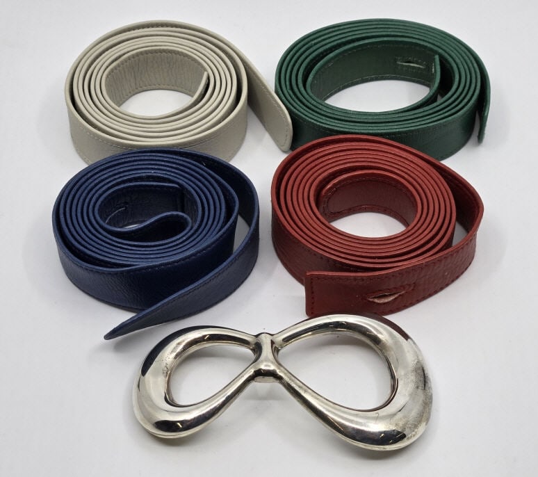 Elsa Peretti Tiffany & Co. Sterling Belts: Elsa Peretti Tiffany & Co Sterling Belt marked made in Italy 1975, selling one silver buckle with (4) interchangeable leather belts , 3/4" width x 46" length, all marked Tiffany & Co.