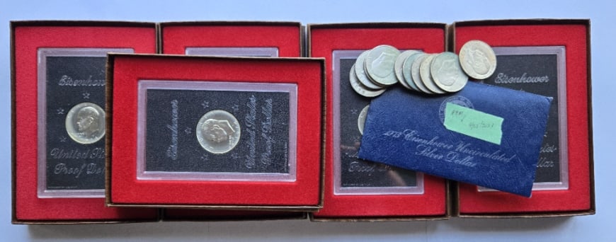 Eisenhower Dollar Grouping: Eisenhower Dollar Grouping - (5) boxed 1974, (1) 1973 , (10) circulated 1971-72.