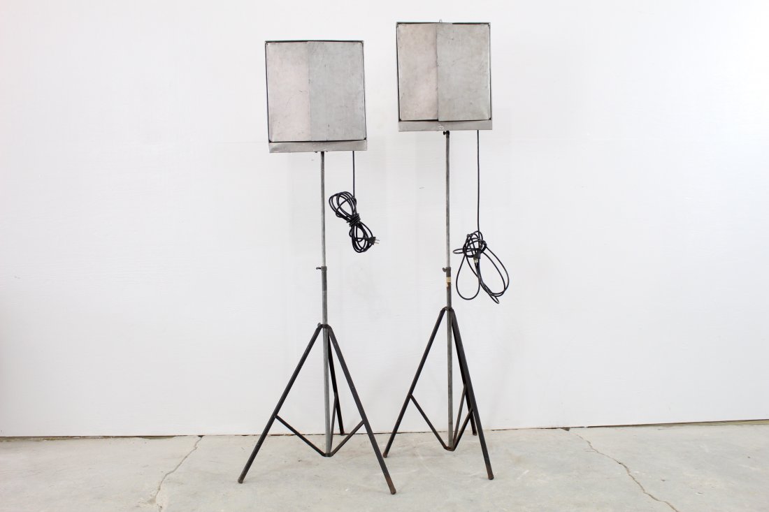 Pair of Industrial Photography Studio Lamps: Pair of industrial photography studio lamps with adjustable flaps and tripods that fold up. Excellent condition, call for additional condition report. Dimensions: 13in x 15in x 60in