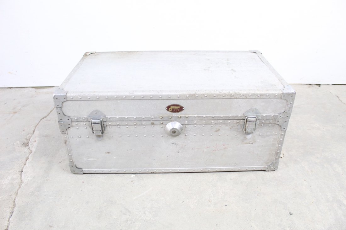 OYE Aluminum Trunk With Great Industrial Look: Large aluminum trunk with the front saying "OYE." A nice industrial suitcase with studs going along the borders and a keyhole on the front. Trunk is in good condition with some light wear from age and