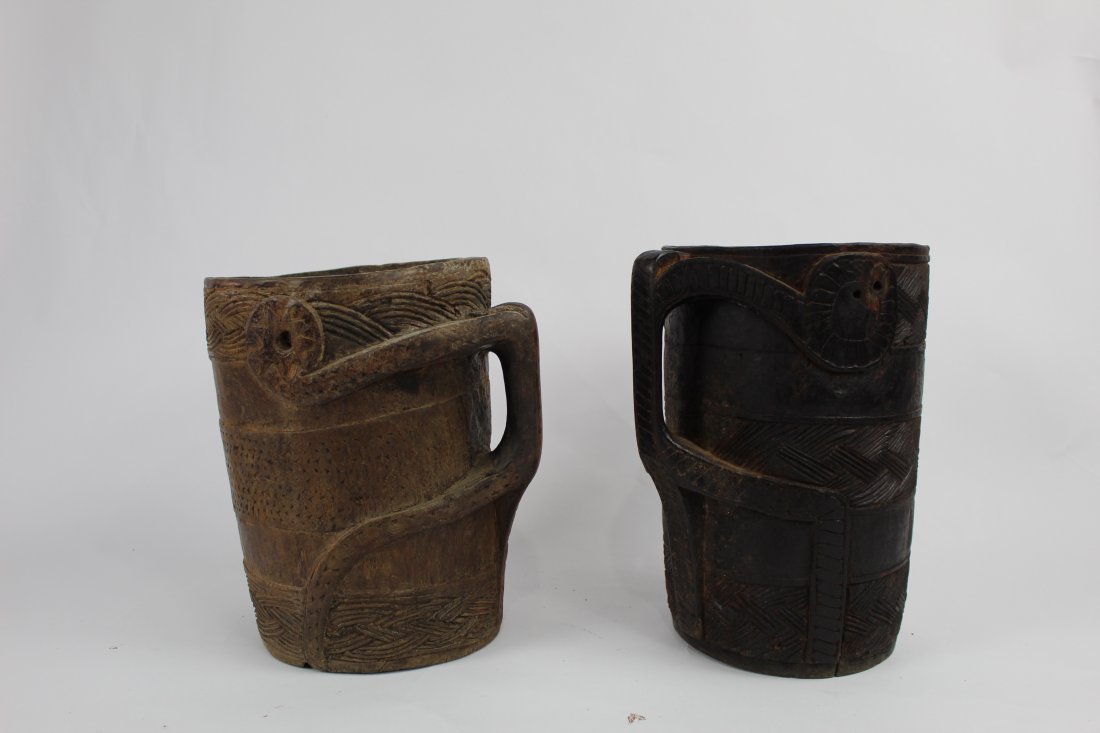 Lot of 2 Nepalese Carved Wooden Water Jug, Nepal: Lot of 2 Nepalese Carved Wooden Water Jug, Nepal. This was a collection we got locally, these are two different jugs. Condition: Very good, Please call or email for a detailed condition report Dimensi