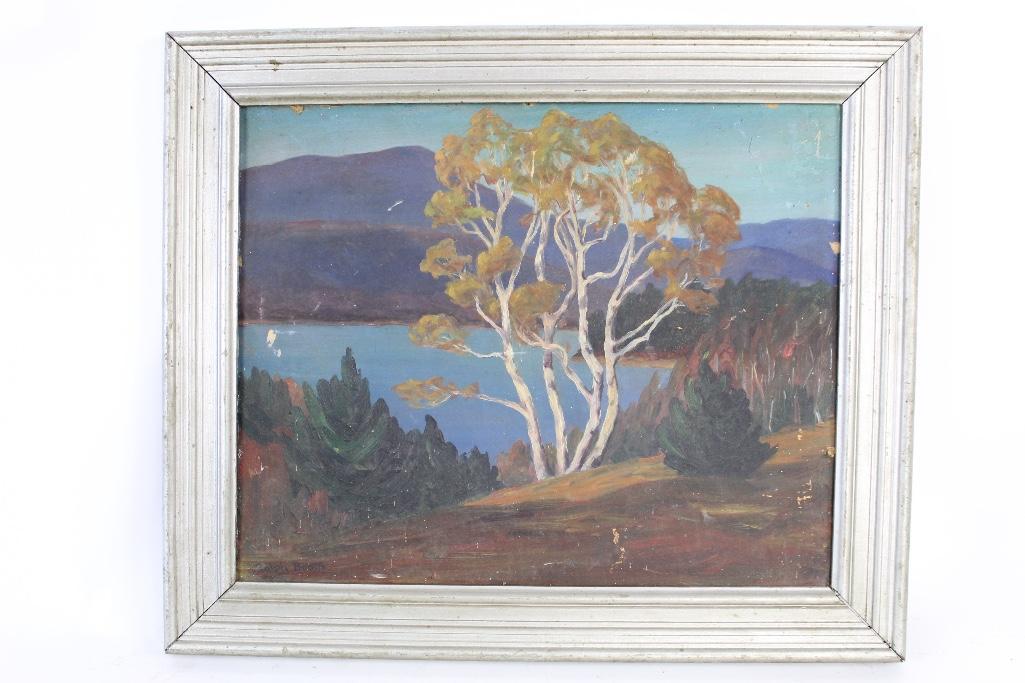 Landscape Painting Framed, by Ralph Booth (1873 -1931): Landscape Painting Framed, by Ralph Booth (1873 -1931). Landscape painting done in darker tones of a white tree with brown leaves in front of a large body of water and moody mountains further behind. 