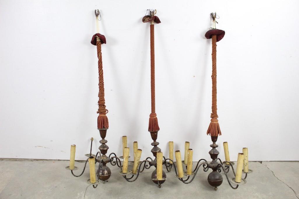 3 Matching French Candelabra Chandeliers with Rope: 3 Matching French Candelabra Chandeliers with Rope. This trio of classic French chandeliers will transport you to romantic French chateau. The dimensions are 57in x 25in x 25in. Condition: These piece