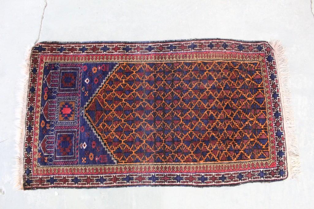 Antique Purple Prayer Rug, 31in x 59in: Purple and orange rug. This rug has beautiful, deep colors and an array of beautiful patterns. It may have been used as a prayer rug. The dimensions are 59in x 31in. Condition: It is in good condition