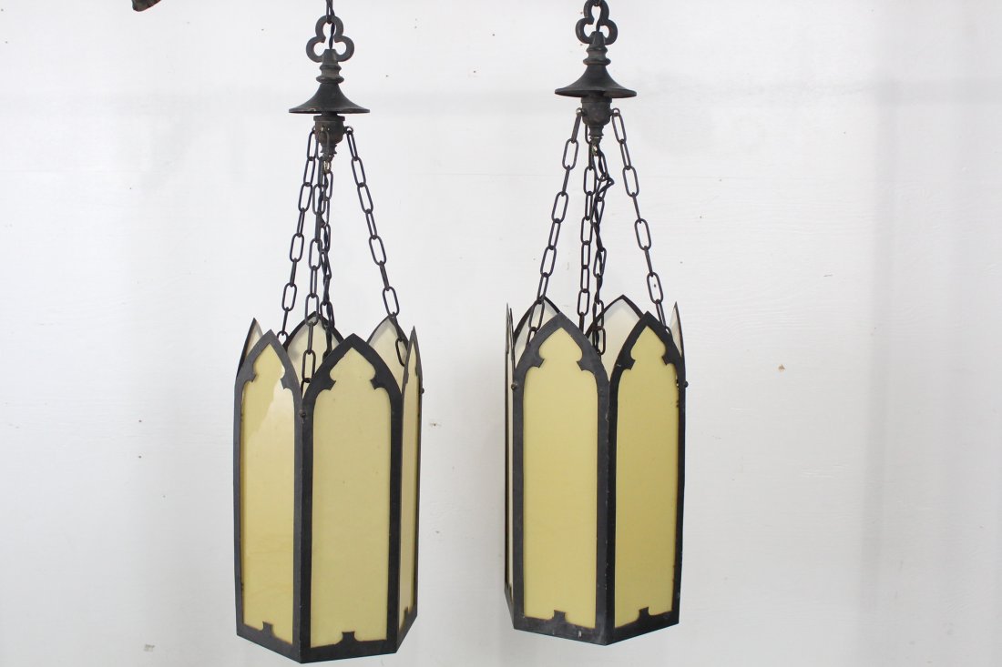 Pair of Gothic Stained Glass Hanging Lights (2of8): Pair of Gothic Stained Glass Hanging Lights. We have a total of 8 of these, being sold two in each auction. They are all rewired and ready to be hung. Interesting stained glass in a dull amber color. 