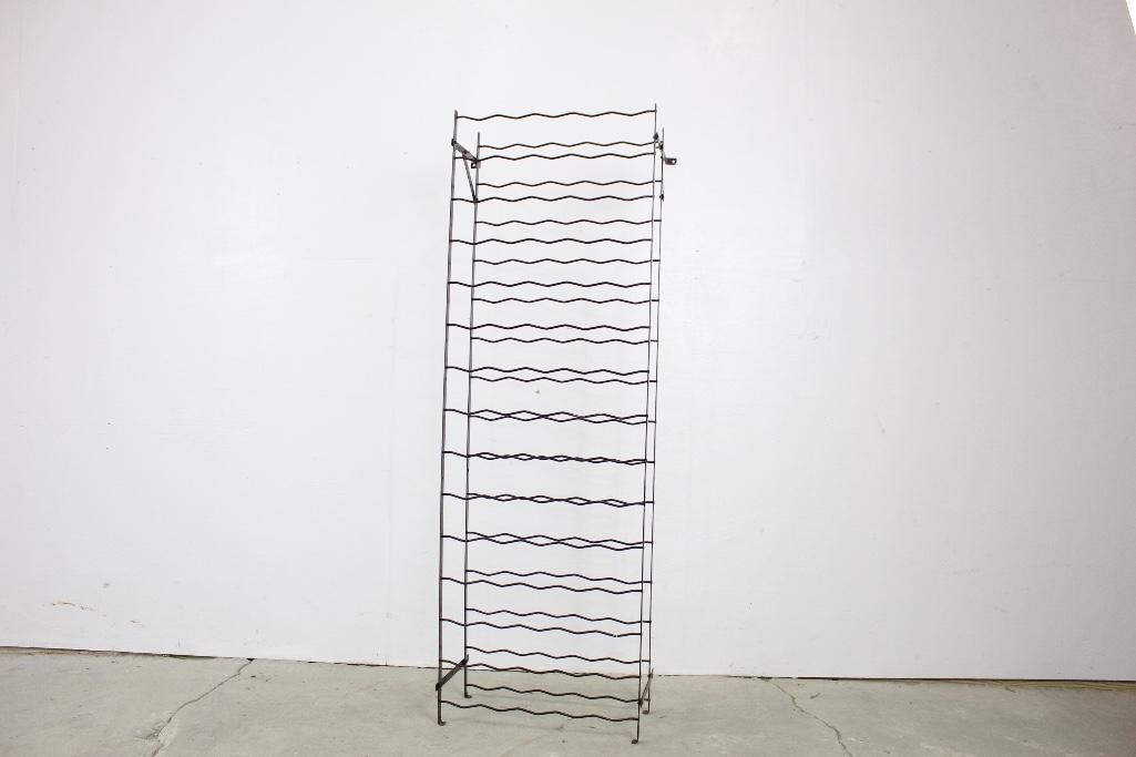French Rigidex Wall Mount Wine Rack Display,France: French wine rack. This wine rack was produced by Rigidex in France. Store your wine in style with this funky wine rack. The dimensions are 60.75in x 22.5in x 10.5in. Condition: The piece is in good