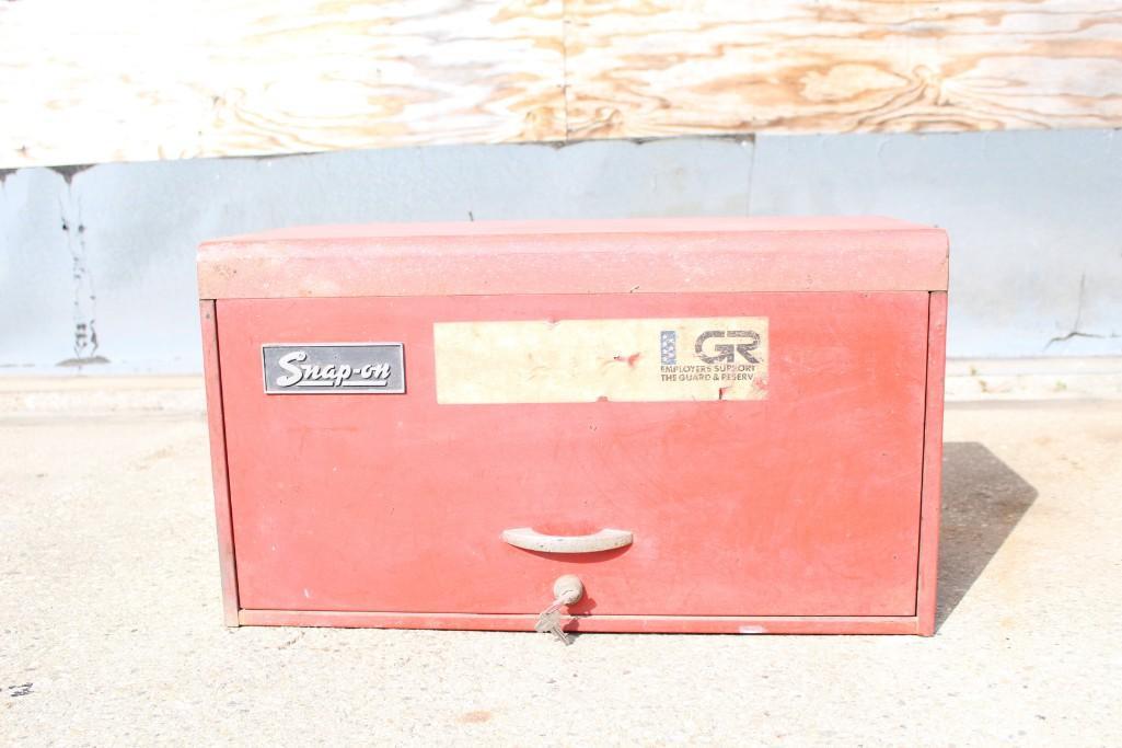 Vintage Snap-On Brand Tool Box,Automotive: Red Snap On brand tool box. This bright red tool box will look great holding your tools or as a display piece for a car or tool lover. The dimensions are 14.5in x 26in x 12in. It is in as is condition