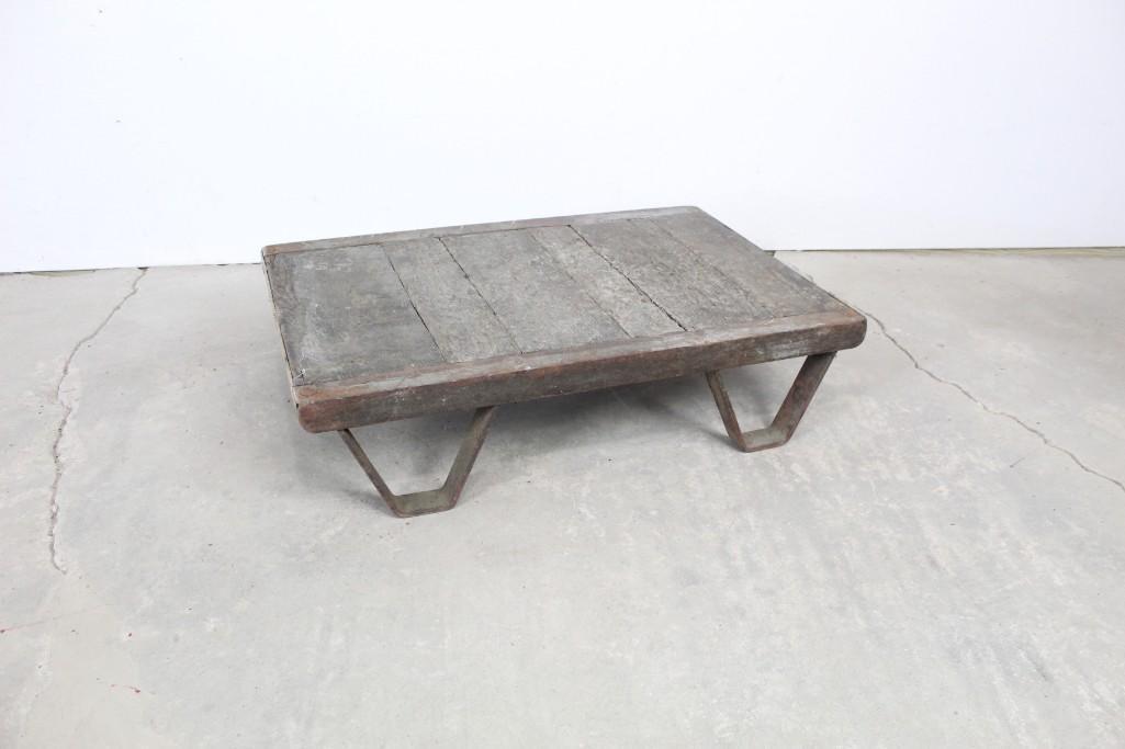 Industrial Steel & Wood Riser Coffee Table: Industrial steel and wood riser. This interesting platform has a rustic feel. The dimensions are 9in x 36in x 24in. It is in fair condition with wear and surface rust all over. Please call or email f