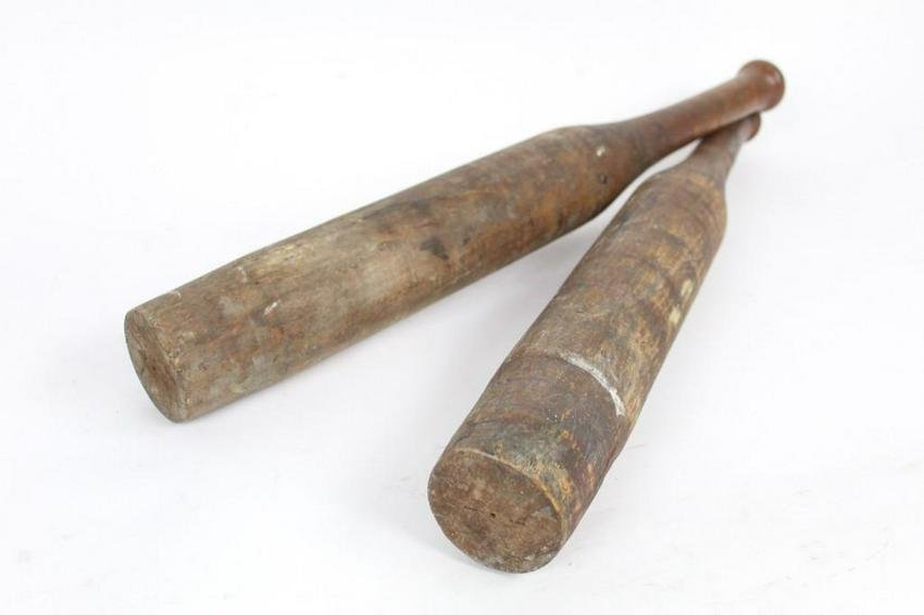Pair of Long Wooden Juggling Circus Clubs, Exercise: Pair of long wooden juggling circus clubs. These wooden clubs were most likely used for juggling. Practice your circus skills or use them as display pieces. The dimensions are 26.5in x 3in x 3in. It i