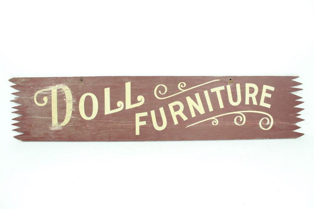 Vintage Painted Plywood "Doll Furniture" Store Sign: Vintage red and white painted wood "Doll Furniture" sign. This cute sign has an interesting decorative edge on either side. It is double sided. The dimensions are 10in x 47in x .5in. It is in very goo