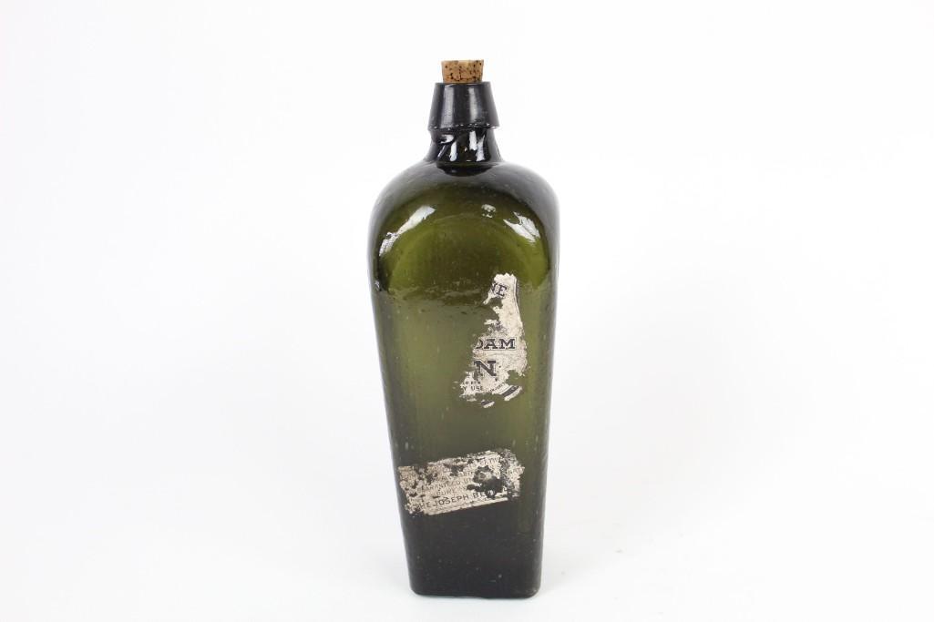 Antique 19thC. Olive-Green Glass Gin Bottle,Paper Label: Beautiful Large Tapered Olive-Green Glass Bottle. This large, olive-green glass bottle features a tapered bottom and cork top. It has a striped detail on each side and features a mostly peeled-off lab