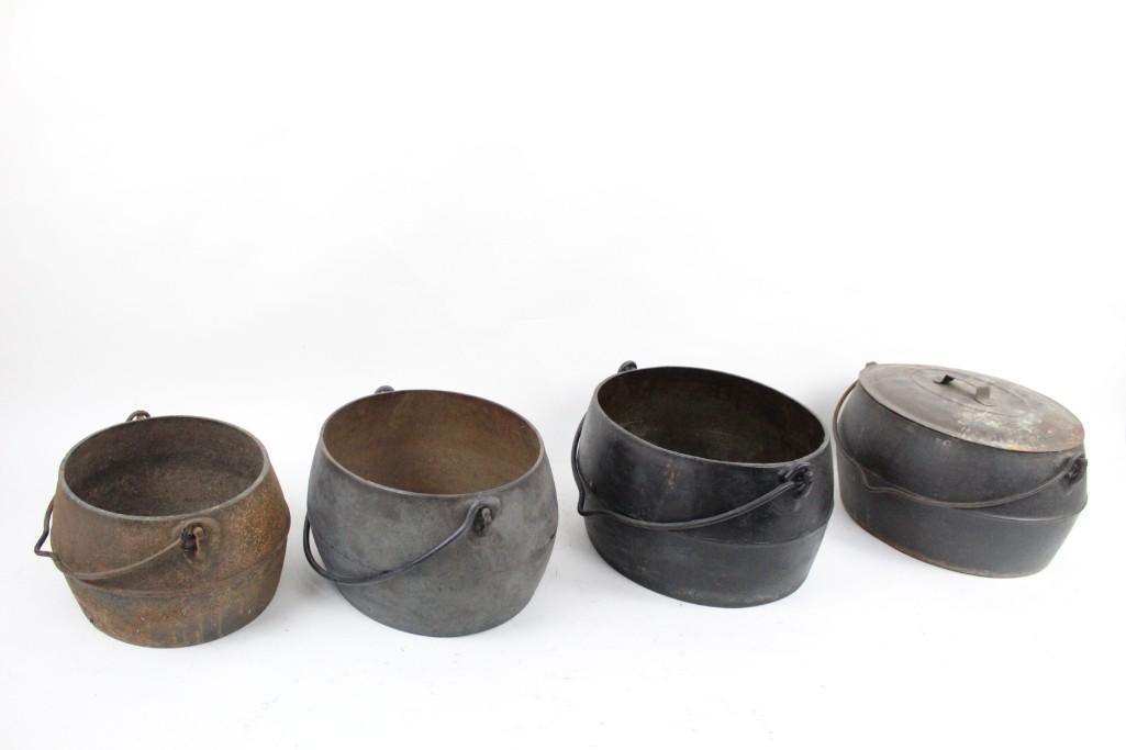 Set of 4 Antique Cast Iron Oval Dutch Ovens w/ Handles (1 of 10)