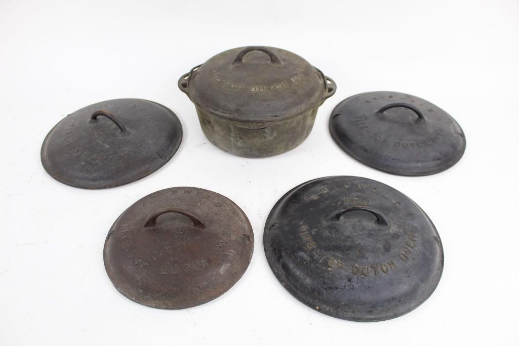 Antique No. 9 Griswold Cast Iron Dutch Oven with 4 Lids (1 of 10)