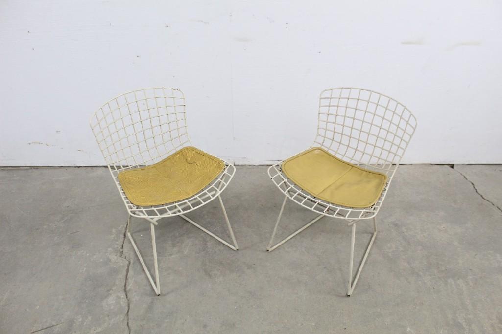 Pair Mid-century Modern Child-size Knoll Bertoia Chairs: Pair of Mid-century Child-size Knoll Bertoia Chairs with yellow chair pads. Label on underside reads "Knoll Associates, 320 Park Avenue". Design by Harry Bertoia. Charming addition to your family room