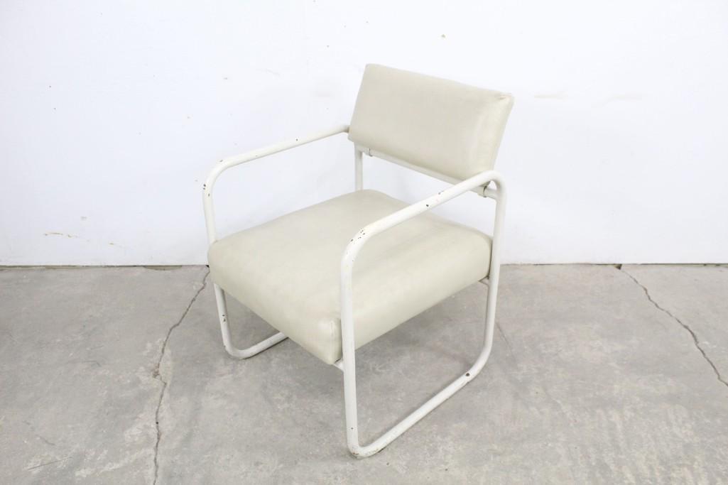 Mid-Century Modern Bauhaus/Aalto Style Metal Arm Chair: Mid-Century Modern Bauhaus/Aalto Style Metal Arm Chair. It is in the style of Alvar Aalto, the owner told us they believed it was designed by Aalto. It has a deep seat with upholstered cushion. Very m