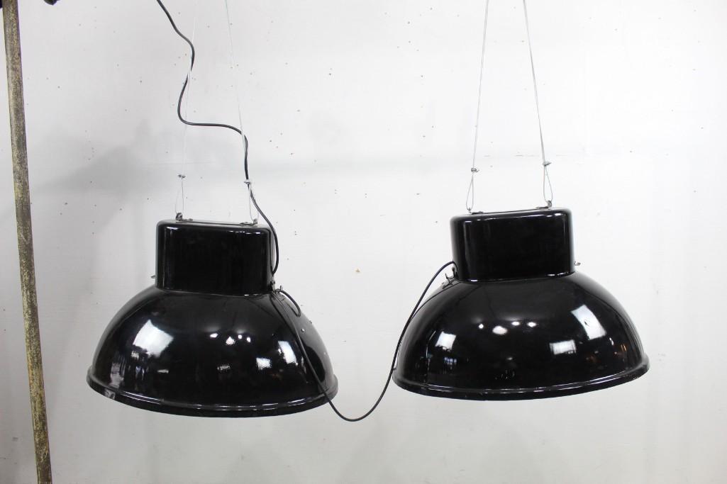 Industrial Pair Large Black Enamel Oval Hanging Lights: Industrial Pair Large Black Enamel Oval Hanging Lights. These two are a pair. They are bold and big, and they are currently wired to hang together. They have an oblong shape. Black metal has a lovely 