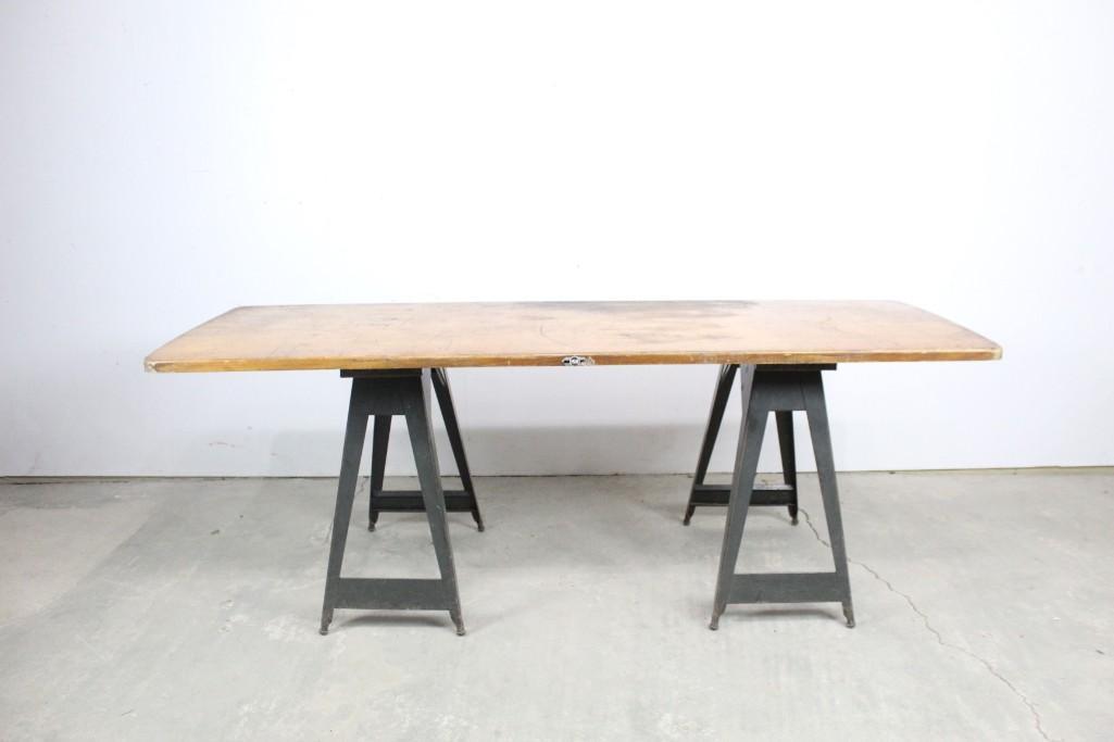 Industrial Work/Farm Table & Green Metal Sawhorses: This table is great, a thick wood top with green metal sawhorses. The sawhorse table has a great industrial vibe. It was made by Hill in Trenton, N.J. The dimensions are 31.25in h x 85in w x 31.25in d