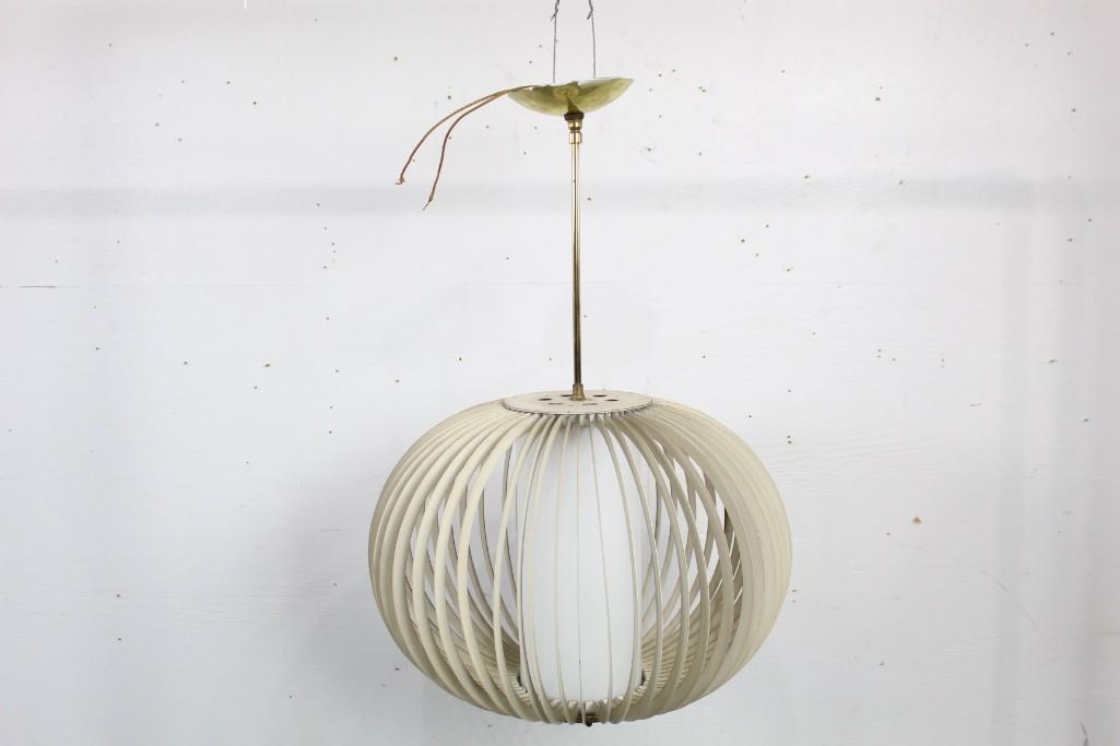 Mid-century Modern White Pleated Hanging Light Fixture: Mid-century modern white pleated hanging light fixture. This piece features an enclosed design, and would look well in a kitchen or common space. Dimensions are 29 in h x 18 in w x 18 in d. Condition 