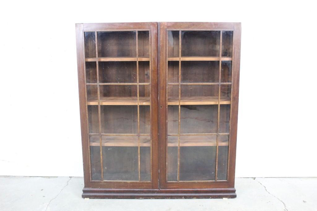 Classic Glass Front Wooden Bookcase, Edwardian: Classic tall dark glass front wooden bookshelf. This bookshelf is the perfect place to house your first editions or precious items. It has a simple, clean design that would look great in any room. The