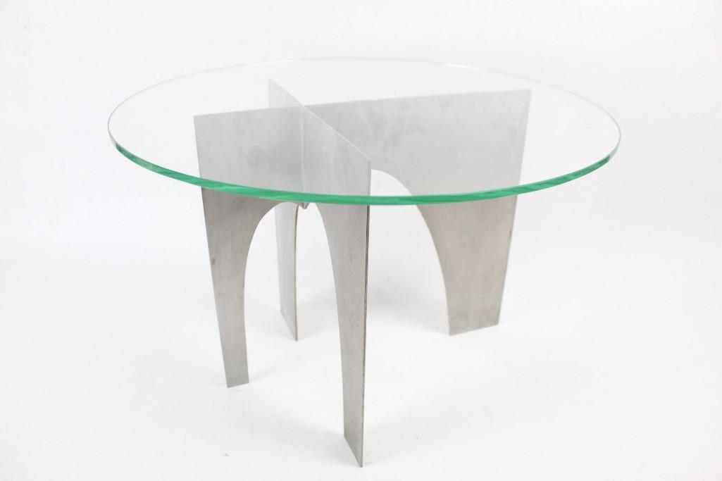 Mid-century Modern Small Aluminum Glass Top Side Table: Mid-century Modern aluminum base glass top side table with an short 2-foot height. Attractive geometric angles and curves and a slightly off-center design give this piece a subtle flair. Dimensions ar