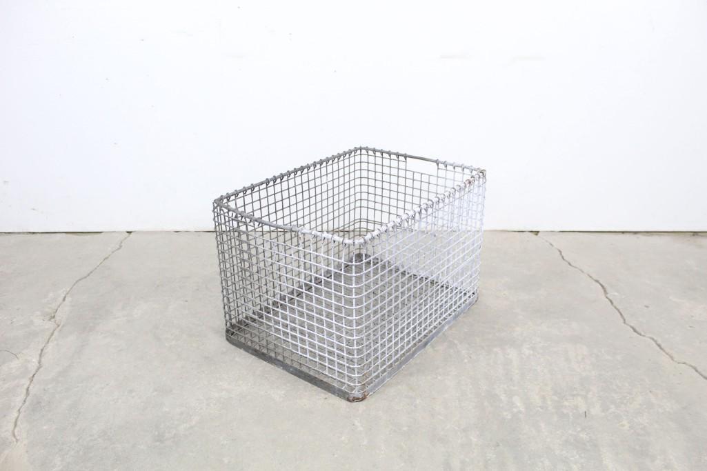 Industrial Galvanized Metal Wire Storage Basket/Bin: Industrial Galvanized Metal Wire Storage Basket/Bin. Its a very sturdy basket, rectangle in shape. Great basket for all your tennis balls, decorative linens, all of your shoes or the knickknacks you j