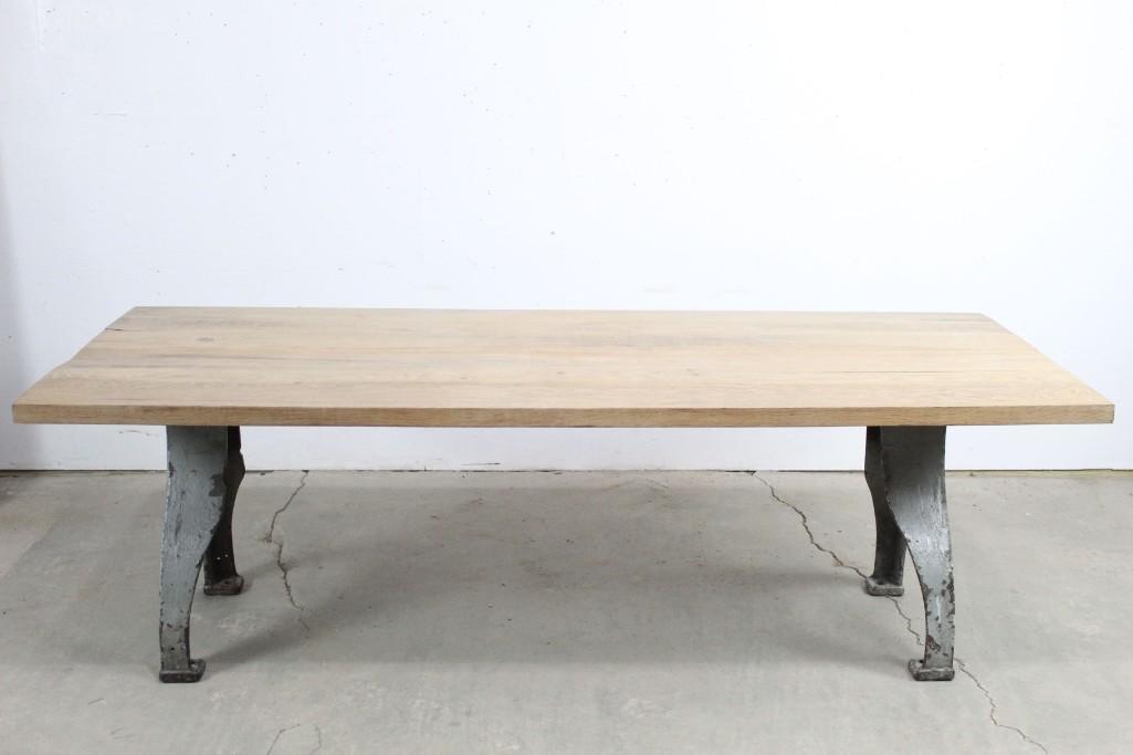 Industrial Table Cast Iron Leg & Butcher Block Top,7ft.: Industrial Table Cast Iron Leg & Butcher Block Top,7ft.. The legs are antique and the top is newly added. Cast Iron legs sure do make for a sturdy table! The dimensions are 30.75 in h x 94.5 in w x 39