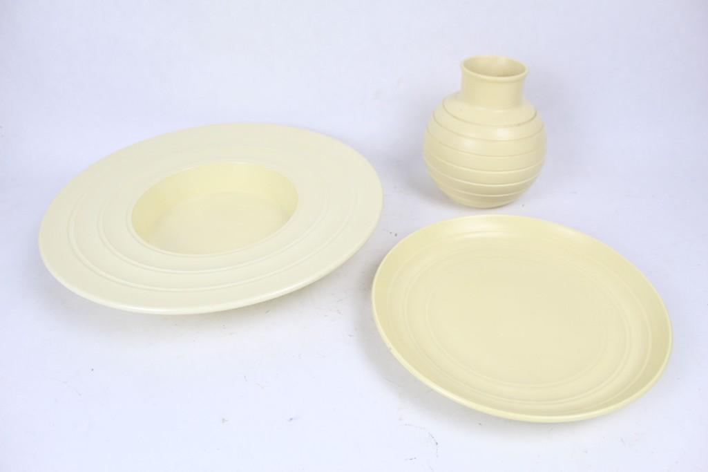 Lot of 3 Cream Keith Murray Wedgwood Pieces,Vase,Plate: Set of three Keith Murray Wedgwood Pieces featuring logo on undersides. All three pieces, a plate, vase and wide rimmed tray are featured in a cream color. Dimensions for the tray are 2.25in H, 13.75i