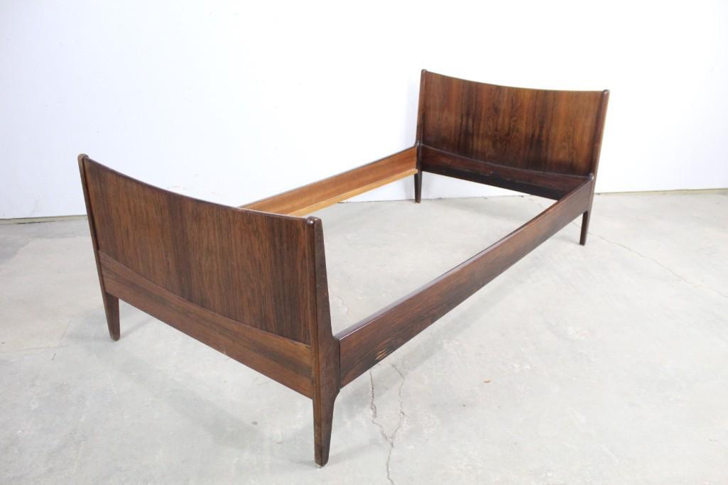 Danish Modern Rosewood Illums Bolighus Twin Bed,1 of 2: Danish Illums Bolighus simple wooden twin bed frame. This Danish bed frame has beautiful wood grain. There is a plaque on the headboard that says "Illums Bolighus Kopenhaven." The dimensions are 31.5i