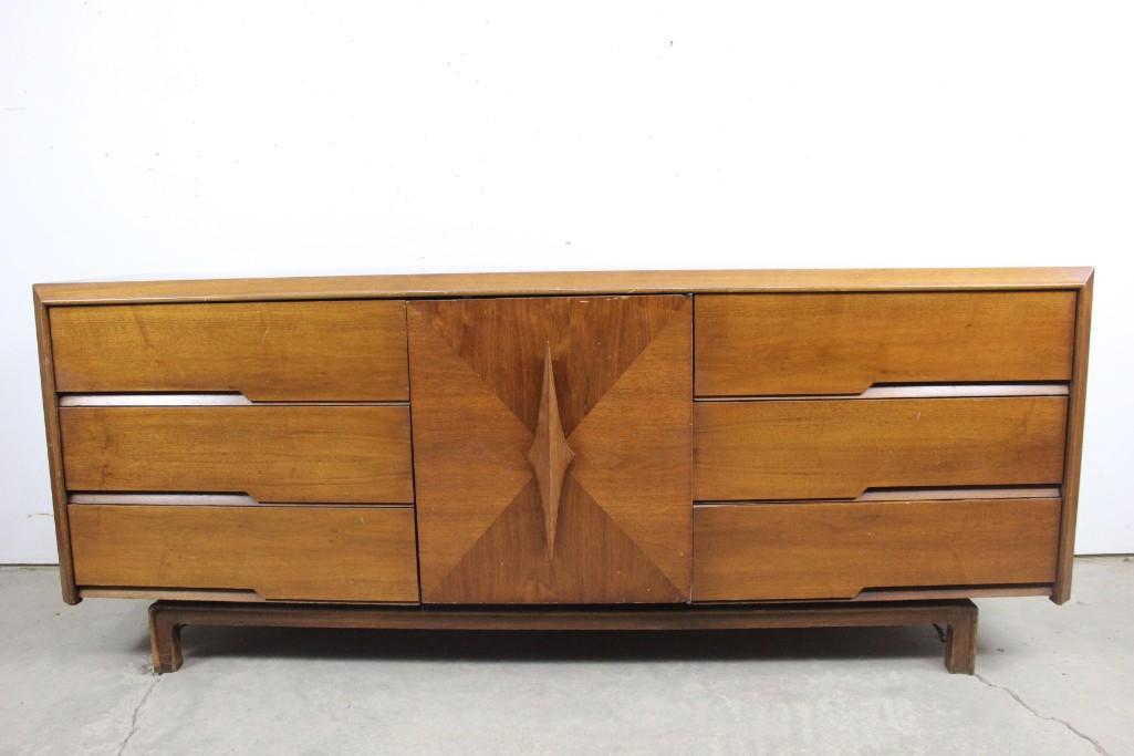 Mid-century Modern Wooden Credenza Cabinet, ACME Co.: Mid-century Modern Wooden Credenza Cabinet, made by ACME Furniture Company in "Imperial Walnut". Credenza features an interesting geometric design on the doors. Versatile and useful piece. The dimensi